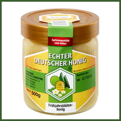 Foto Glas Fruehjahrsbluetenhonig